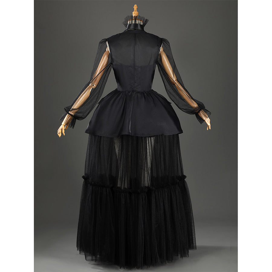 Addams black evening dress back view showing mesh sleeves and tiered skirt details