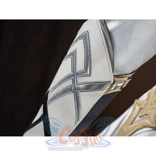 Detail of the silver arm bracer on Aether cosplay costume showing X-pattern stitching and gold diamond gem clasp