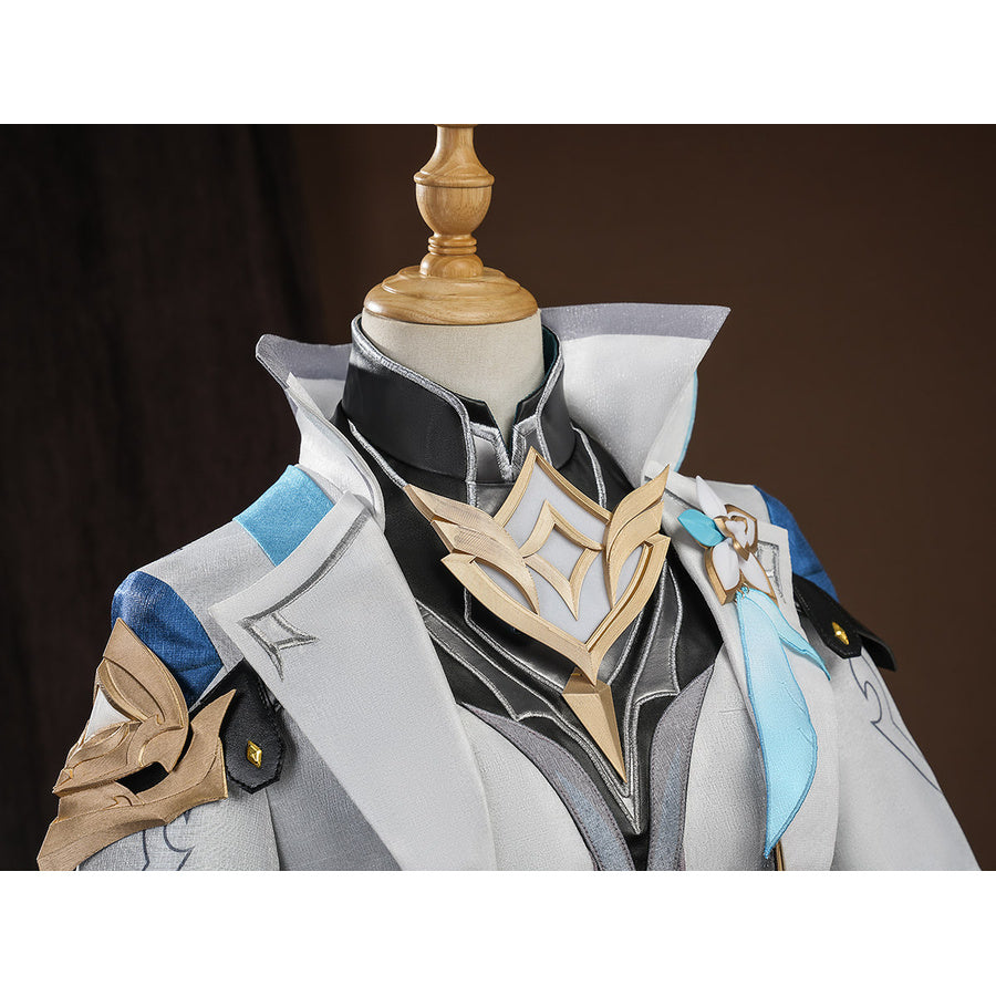Close-up detail of Aether cosplay costume chest area with gold emblem, black collar, and blue shoulder armor