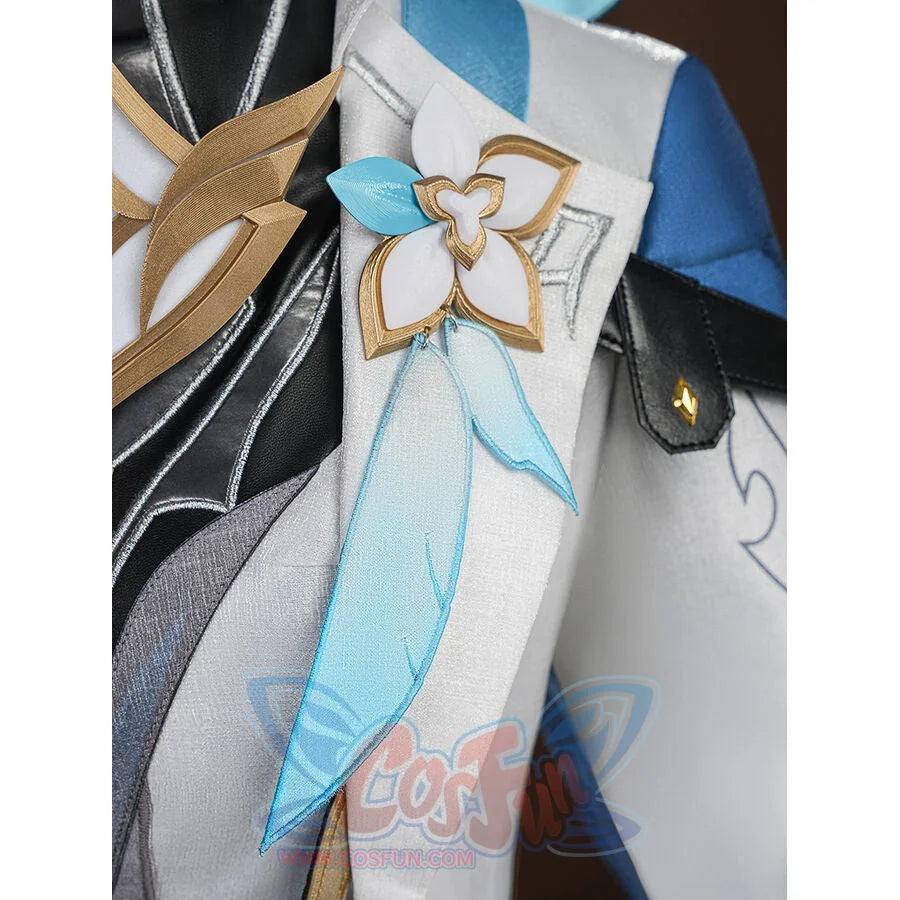 Detail of white flower brooch with gold trim and blue fabric ribbons on the Aether cosplay costume front