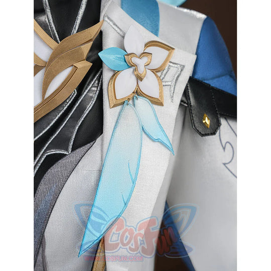 Detail of white flower brooch with gold trim and blue fabric ribbons on the Aether cosplay costume front