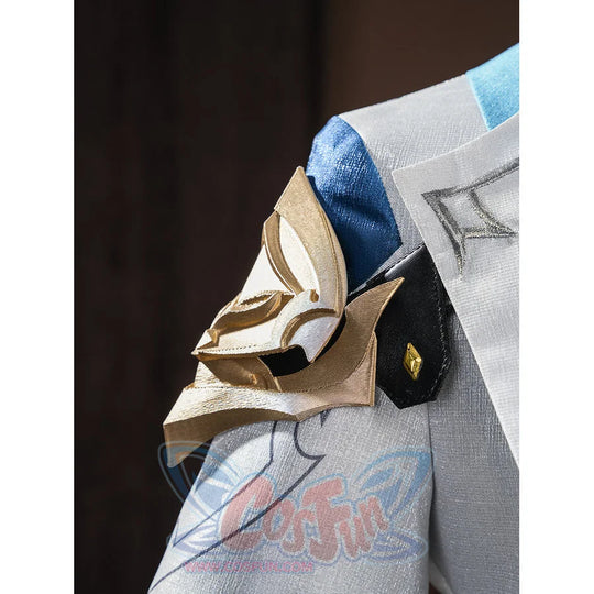 Close-up of gold layered shoulder armor on Aether cosplay costume with black pouch and blue fabric detail
