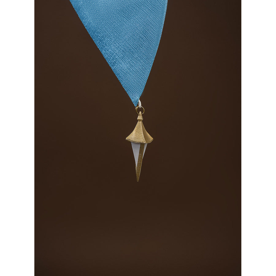 Gold tassel pendant hanging from blue fabric ribbon, an accessory included with the Aether cosplay costume