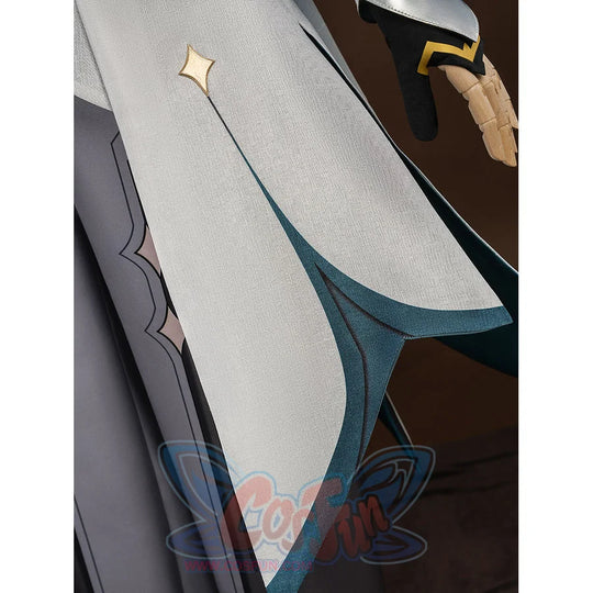 Detail of the lower coat tail on Aether cosplay costume with gold diamond stud, embroidered edge, and teal lining