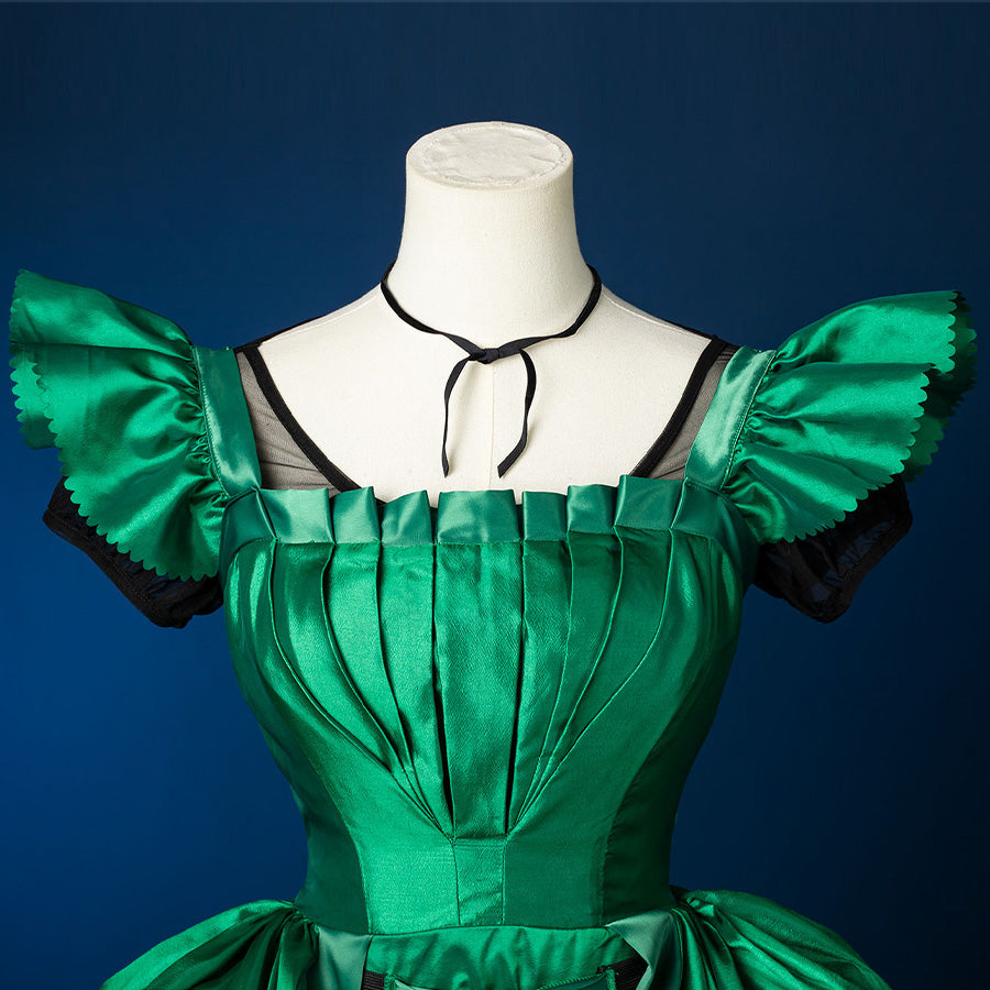 Agnes DeMille cosplay costume bodice close-up with pleated green satin and ruffled puff sleeves