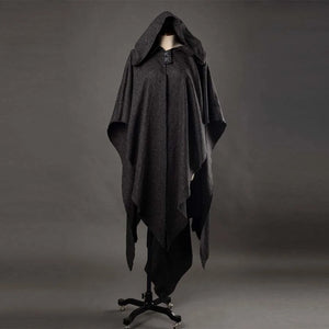 A mannequin showcases a dark gray, hooded Ahsoka cosplay cloak with an uneven hem, mounted on a black stand against a gray background.