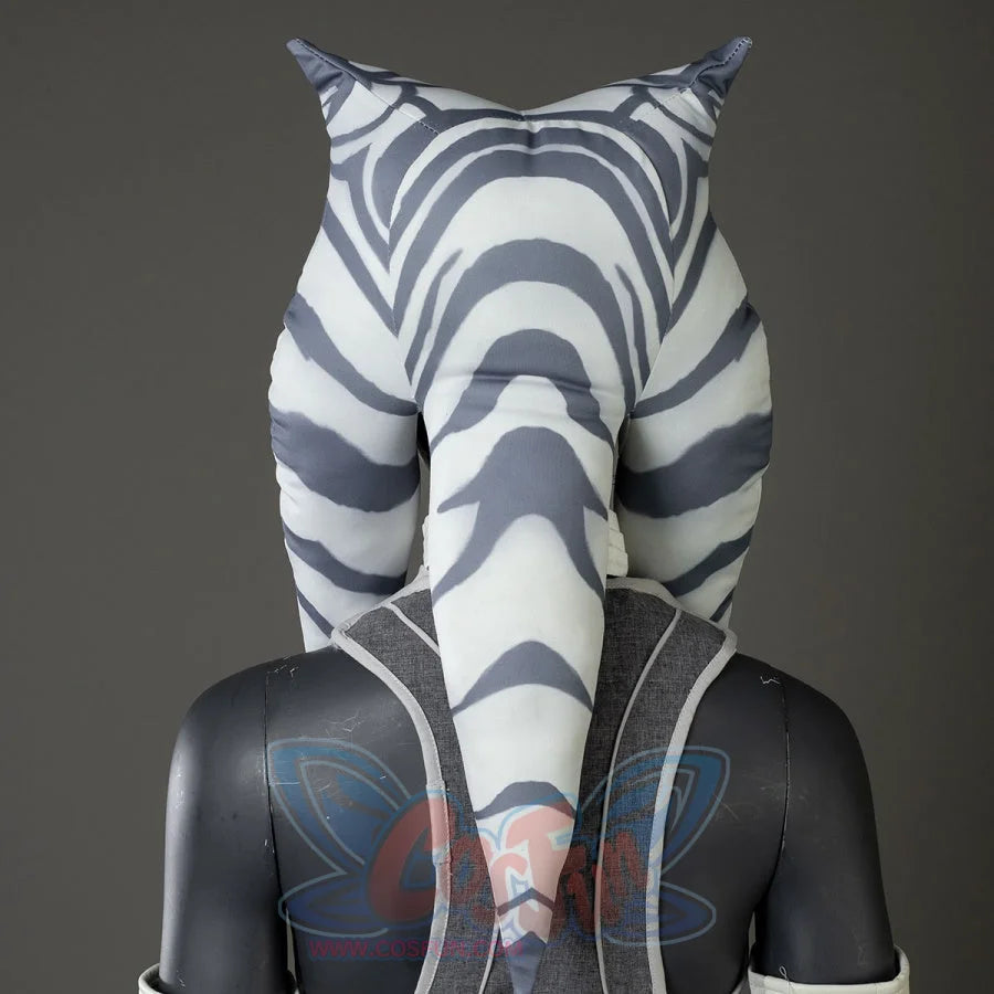 Focuses on the back of Ahsoka Tano’s headpiece, showcasing the striped pattern of her montrals and the gray vest’s design.
