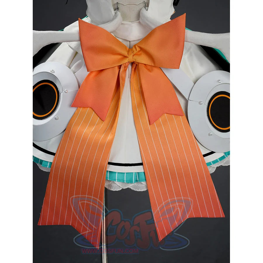 Zenless Zone Zero Aria cosplay back view anchors a large orange striped bow beside segmented white shoulder armor pieces.
