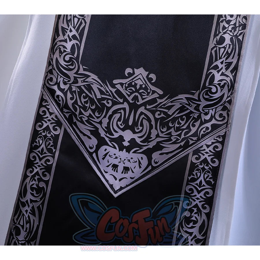 Detail view of back, a black piece is shown, decorated with delicate patterns.