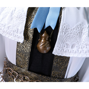 The necklace is bronze and shaped like a bottle.