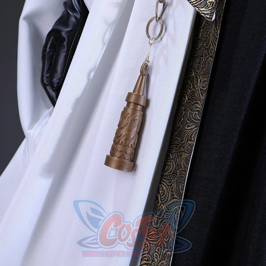 There is a belt with a metal chain and decorations at the waist and bells, an ornament is hung on the chain.