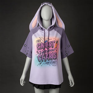 Hoodie with colorful text design on a mannequin against a dark background