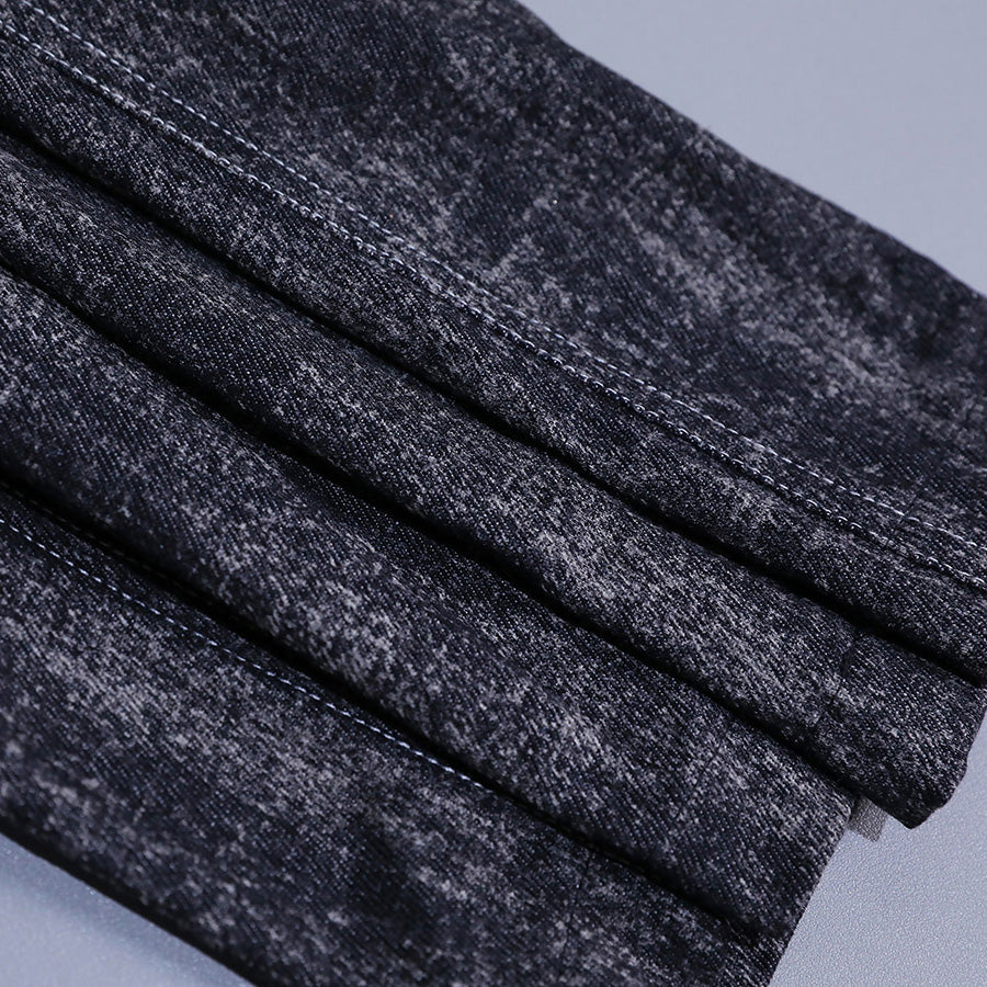 Close-up texture detail of distressed denim fabric used in Alicia cosplay costume