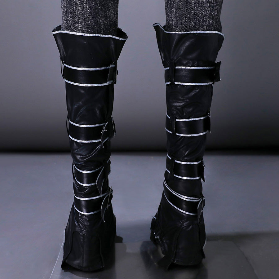 Close-up of black boots with decorative silver strap details from Alicia cosplay costume set