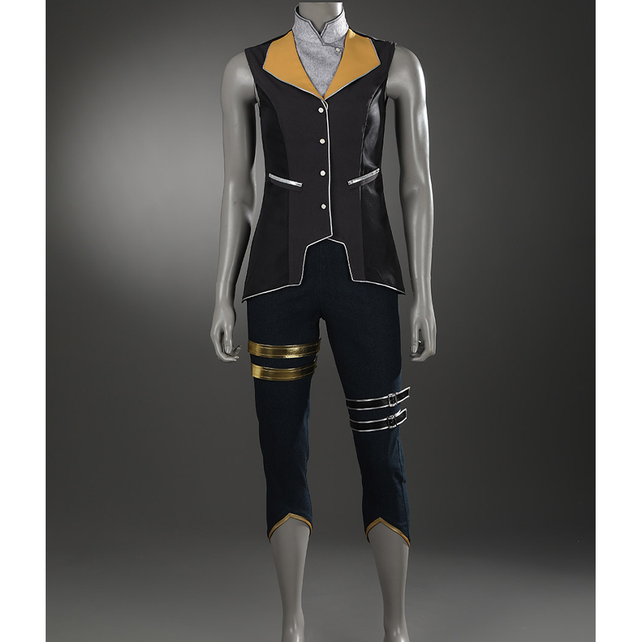 The cropped pants feature metallic decorative bands and gold-trimmed hems.