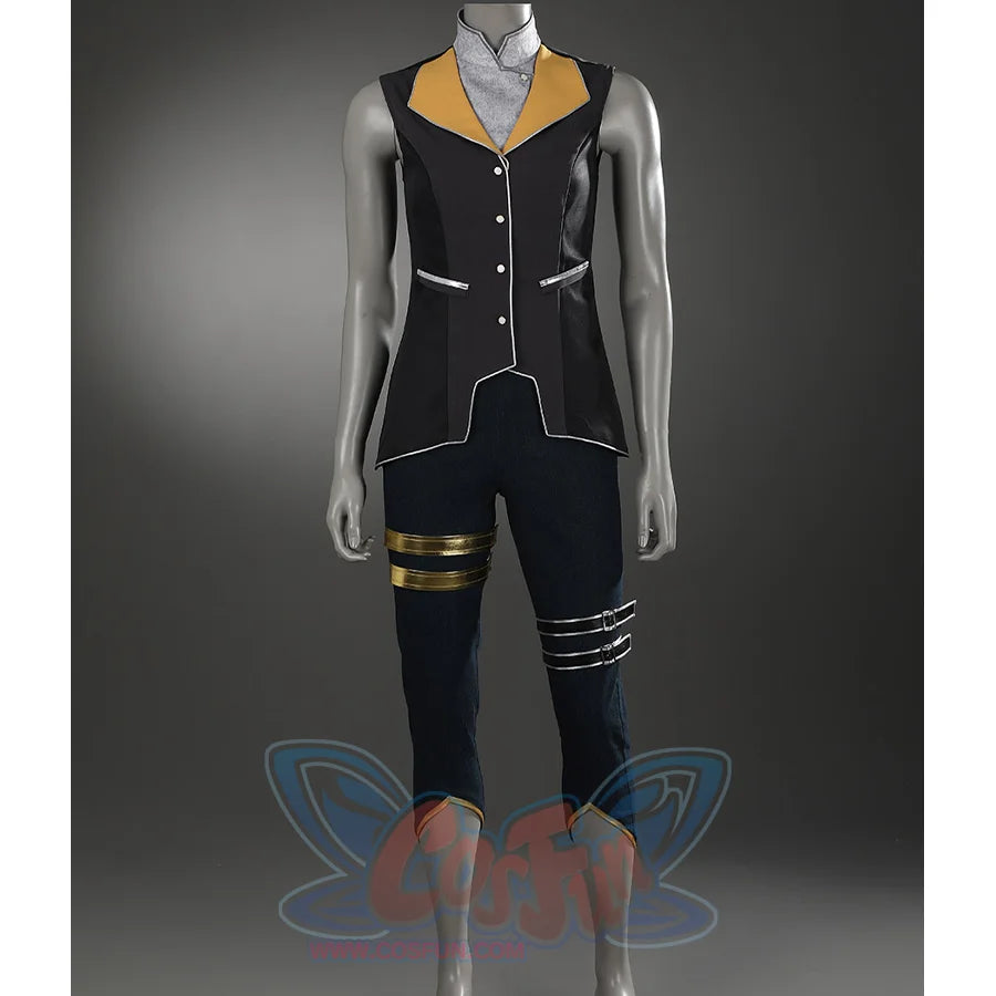 The cropped pants feature metallic decorative bands and gold-trimmed hems.