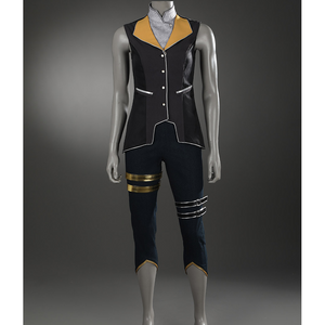 The cropped pants feature metallic decorative bands and gold-trimmed hems.