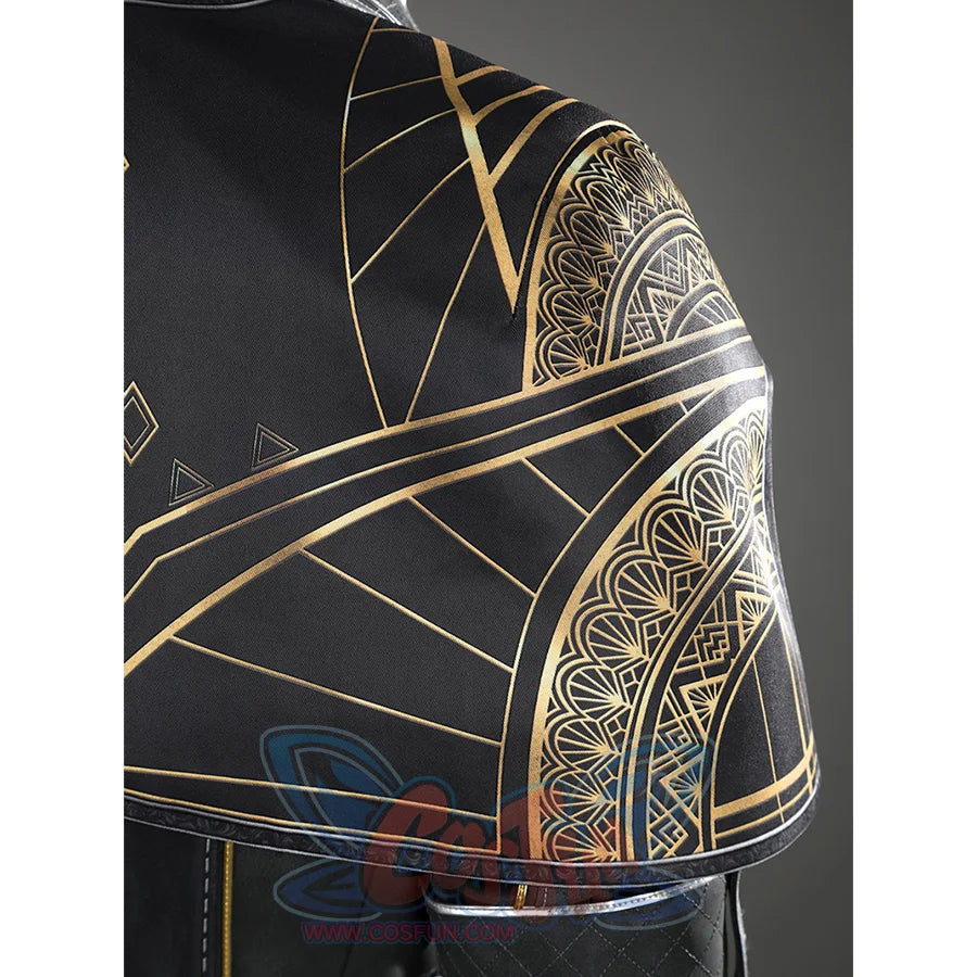 The long overcoat has a striking gold geometric pattern on the right shoulder.