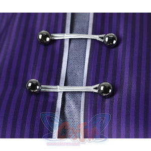 The buttons on the inner garment are metal snap buttons.