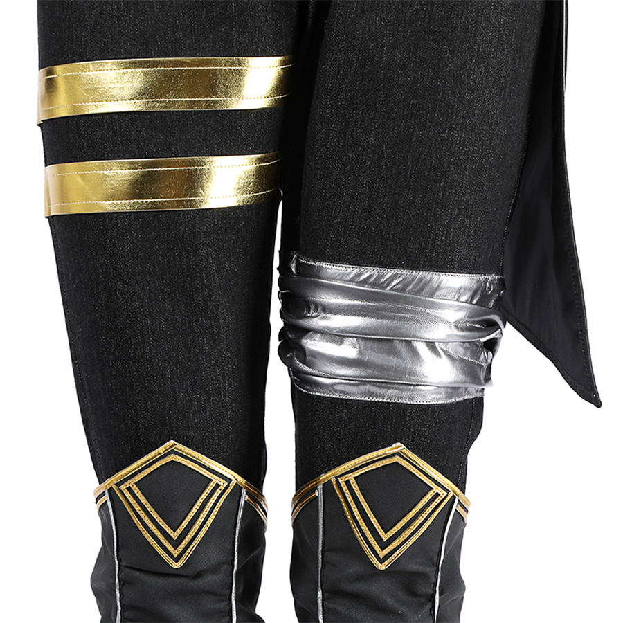 The pants incorporate asymmetric details, golden straps on the left and a silver guard on the right.