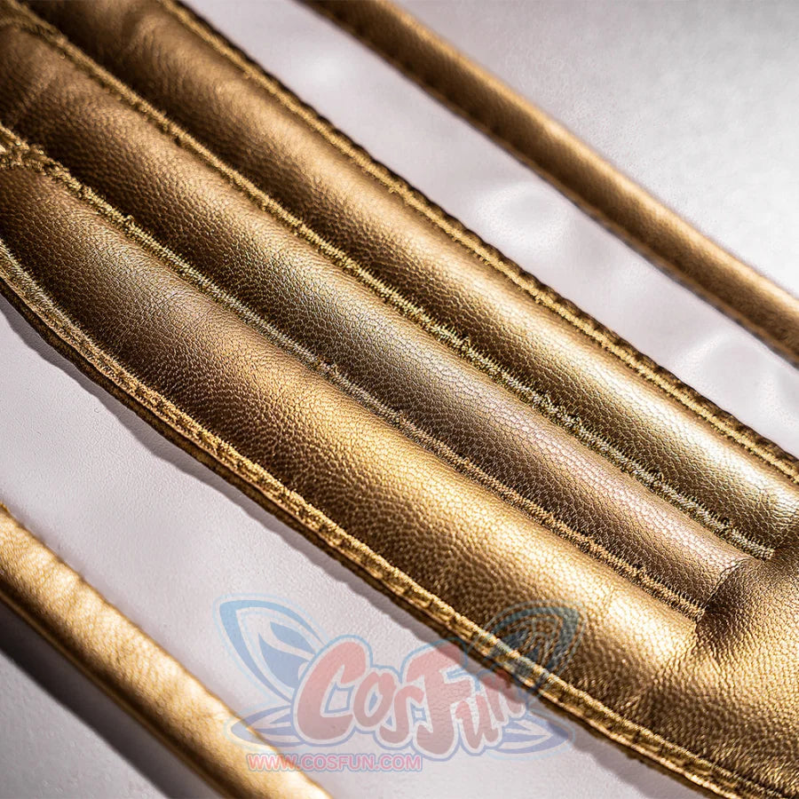 Anime Lelouch cosplay panel detail traces raised stitched channels of textured gold faux leather across white fabric.