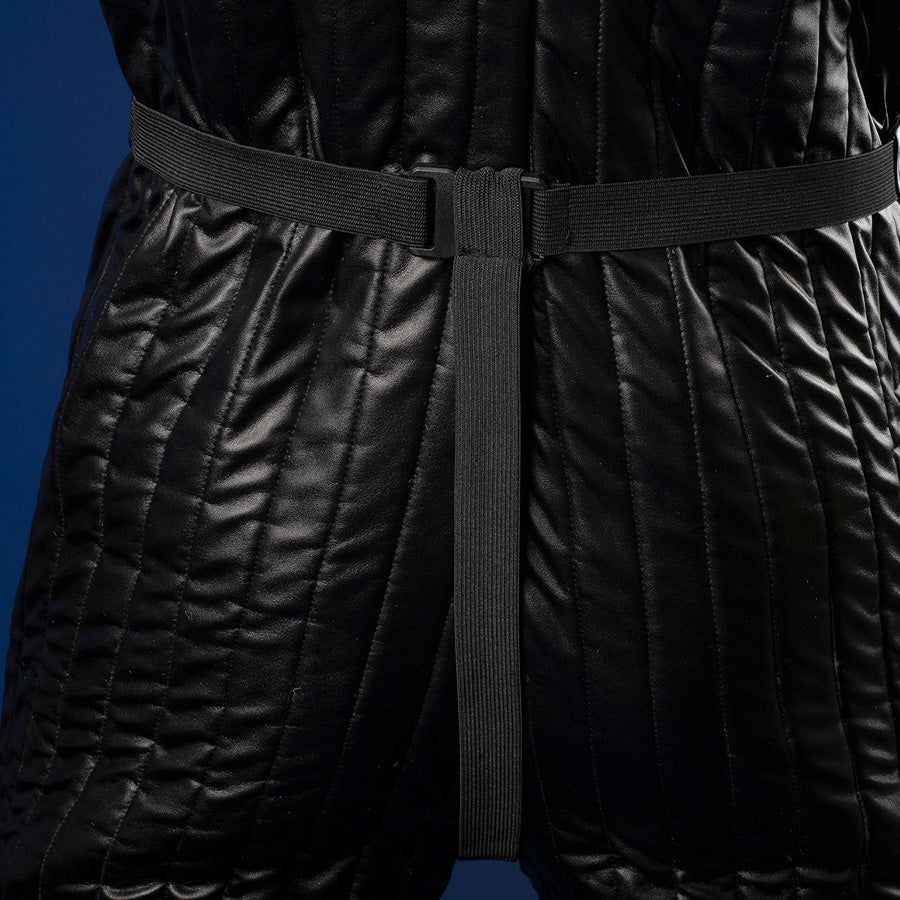 Luke Skywalker cosplay costume leg wrap straps closeup with textured pants detail