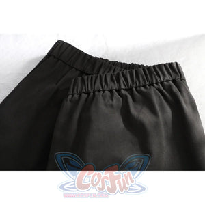 Close-up of Dunk cosplay black pants elastic waistband showing gathered fabric construction detail.