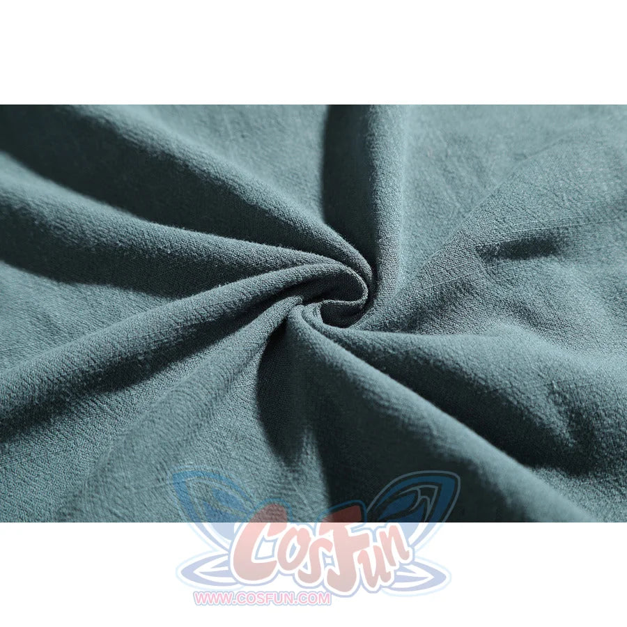 Macro close-up of Dunk cosplay blue tunic fabric showing soft linen-cotton blend texture and natural folds.