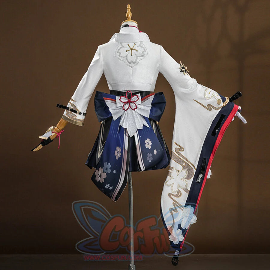 Evanescia cosplay rear view showcasing white jacket back with embroidered details and navy hakama with large bow