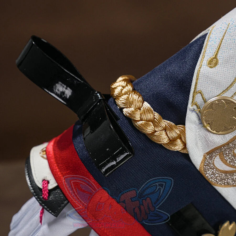 Evanescia cosplay shoulder detail with gold braided cord, black strap, navy and red waistband, and gold sakura coin emblem.