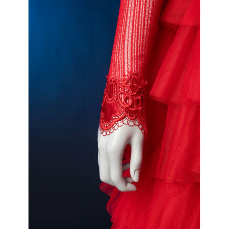 Lydia Deetz cosplay red sheer striped top pairs lace cuffs above a matching tiered tulle skirt.