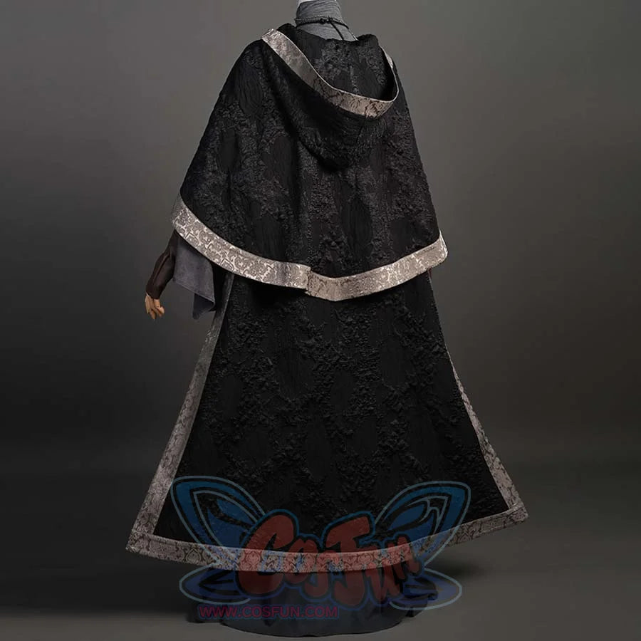 Presents back of black hooded cloak with decorative gray trim. Trim’s repeating pattern frames the cloak, enhancing its structured silhouette.