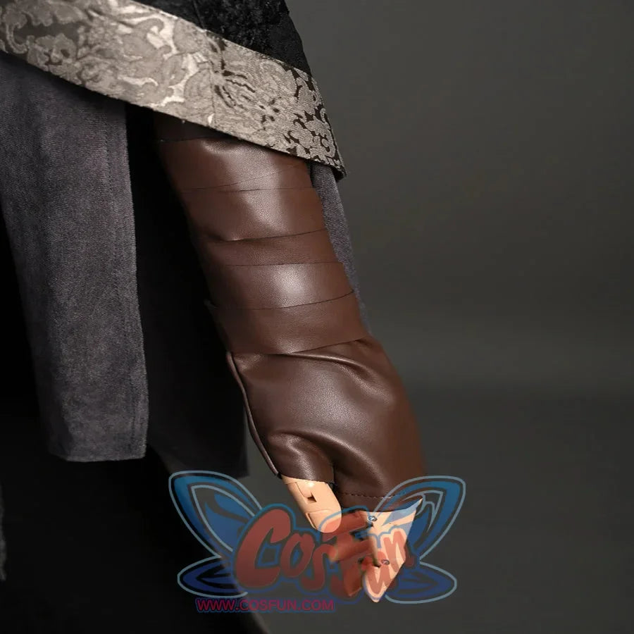 Focuses on brown leather glove with wrapped straps. Straps add layered texture; smooth leather contrasts the outfit’s lace elements.