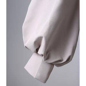 Riyo cosplay costume white jacket sleeve close-up showing fabric texture and cuff design