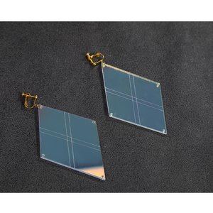 Game Rivals Emma Frost Cosplay Costume, square-shaped earrings with X-shaped engravings.