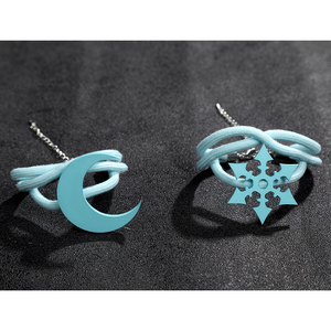 Game Rivals Luna Snow Cosplay Costume, one is decorated with a moon, the other with a snowflake.