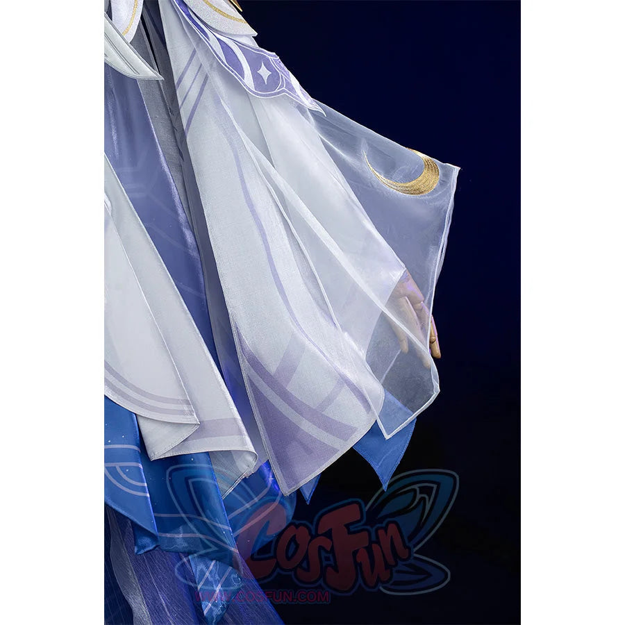Columbina cosplay costume sleeve detail with sheer layered fabric and gold crescent moon accent