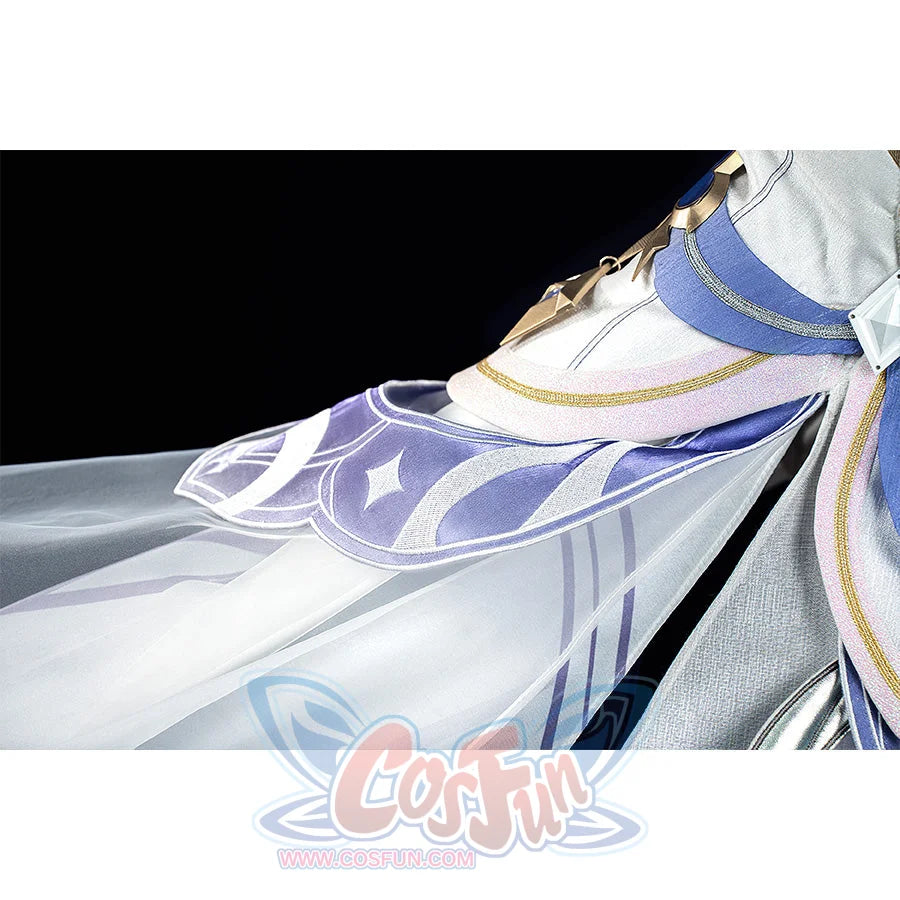 Columbina cosplay costume waist detail showcasing star patterns, blue fabric, and gold chain trim