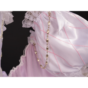 FES Columbina cosplay costume sleeve with decorative gold pearl chain and pink ribbon patterns