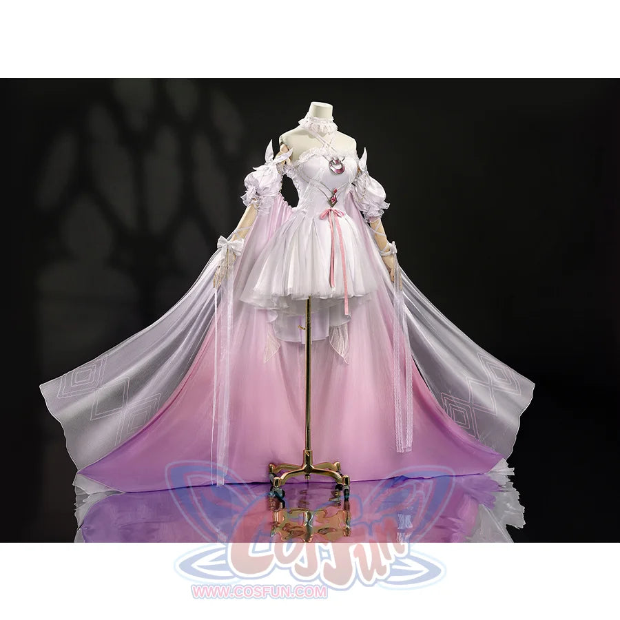 Side view of elegant FES Columbina cosplay costume showcasing flowing pink skirt and cape details