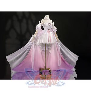 Side view of elegant FES Columbina cosplay costume showcasing flowing pink skirt and cape details