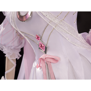 Close-up of FES Columbina cosplay costume waist showing pink gem pendants and ribbon bow detail