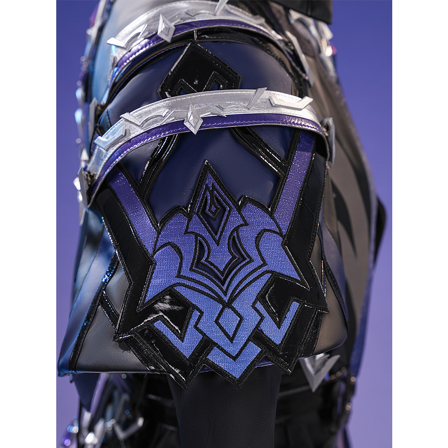 Flins cosplay costume cloak detail featuring intricate blue and black geometric embroidery with silver trim