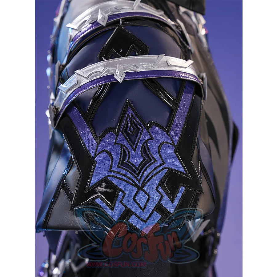 Flins cosplay costume cloak detail featuring intricate blue and black geometric embroidery with silver trim