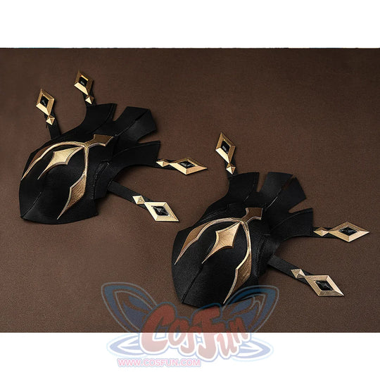 Detail shot of Genshin Impact Varka cosplay boots knee pads with black and gold diamond-shaped accents