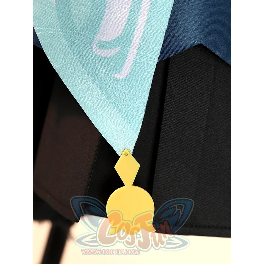 Yaoyao cosplay costume skirt detail showing black fabric, teal coat hem, and yellow decorative charm pendant