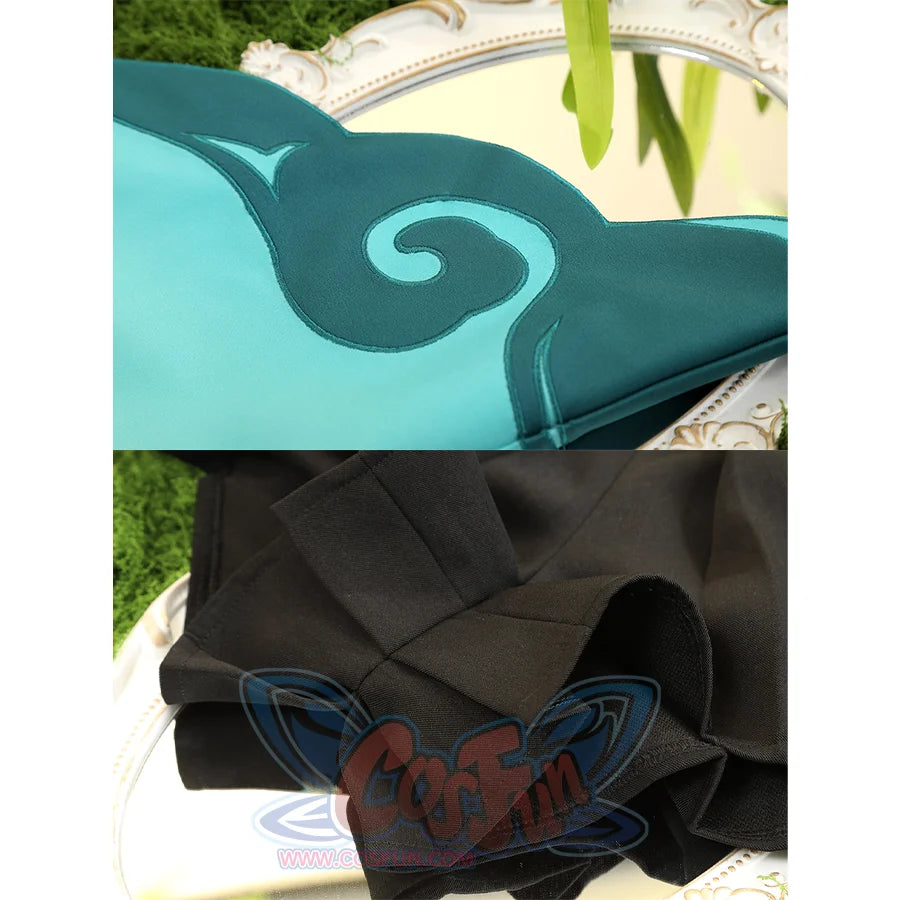 Genshin Impact Yaoyao cosplay garment centers dark teal cloud applique beside folded black pleated cuffs.
