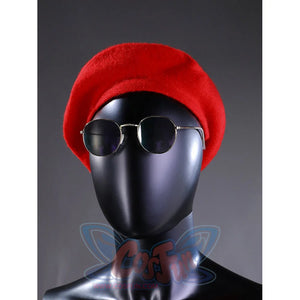 Gustave cosplay accessory close-up showing a red beret and round sunglasses worn on the mannequin