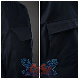 Shows side and front pockets of the navy - blue jacket. Highlights pocket shape and stitching.