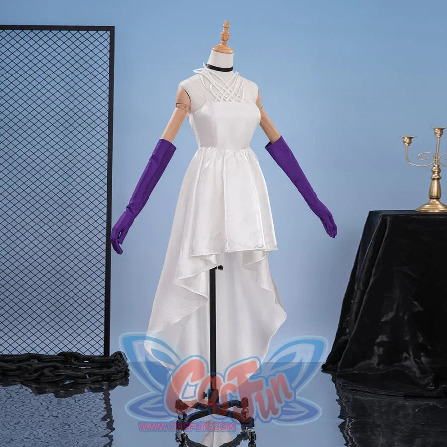 Presents the high-low white gown’s embroidery, asymmetrical hem, and sleek silhouette, emphasizing its elegant base design.